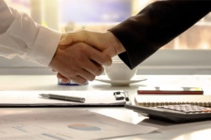 Partner handshake; Partner with LanguageBird to Expand Language Offering
